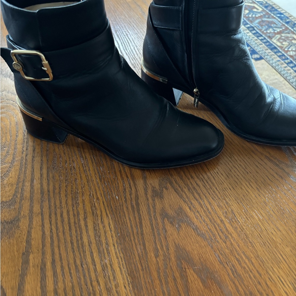 Jimmy Choo Black Ankle Clarise boots with Gold Buckle 38.5